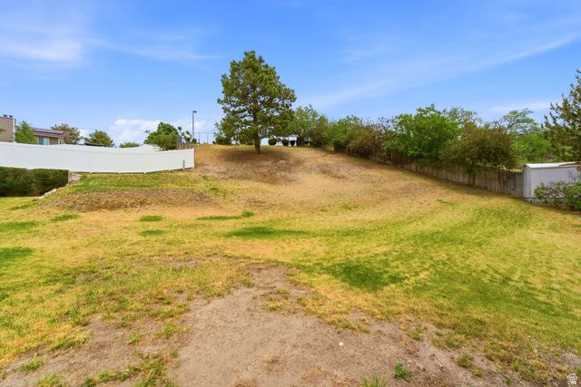 9057 S CHERBOURG PL, Sandy, UT 84093