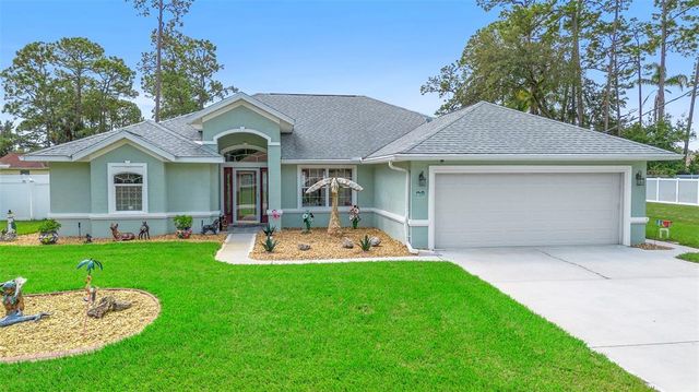88 WOODSIDE DRIVE, Palm Coast, FL 32164