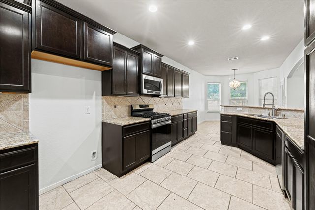 21107 Knight Quest Drive, Tomball, TX 77375