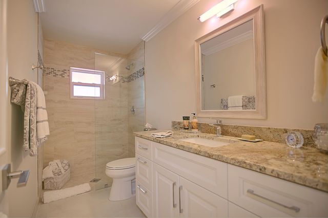 455 S Country Club Drive, Atlantis, FL 33462