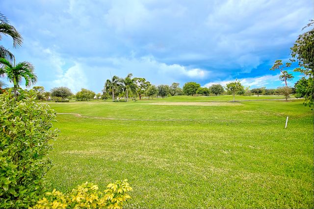 455 S Country Club Drive, Atlantis, FL 33462