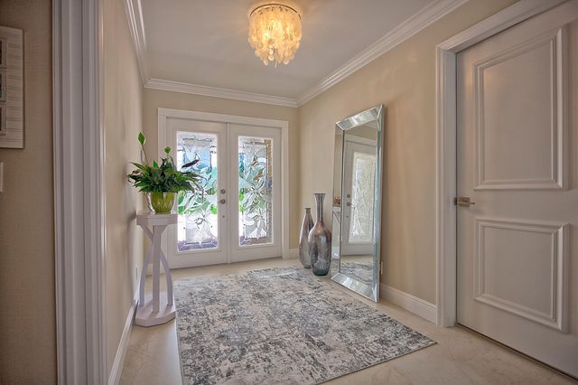 455 S Country Club Drive, Atlantis, FL 33462