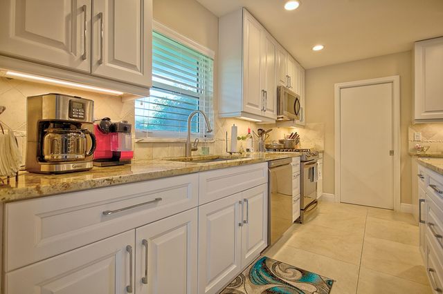 455 S Country Club Drive, Atlantis, FL 33462