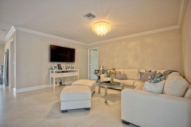 455 S Country Club Drive, Atlantis, FL 33462