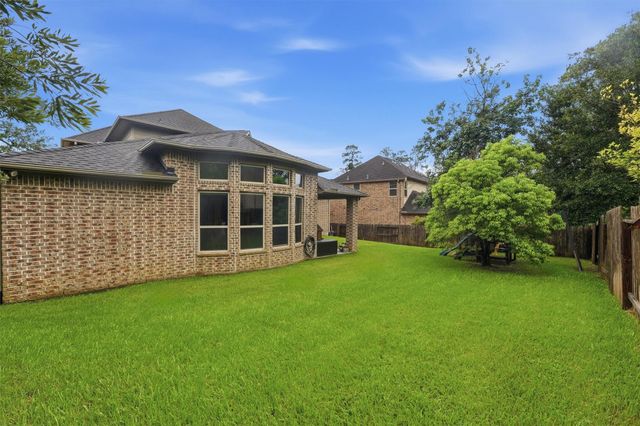210 Fox Squirrel Court, Pinehurst, TX 77362