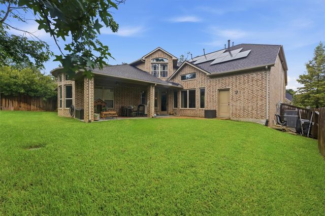 210 Fox Squirrel Court, Pinehurst, TX 77362