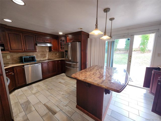 55 Holiday Park Drive, Centereach, NY 11720