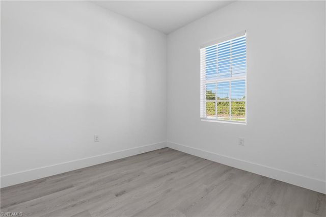 721 Ivan AVE S, Lehigh Acres, FL 33973