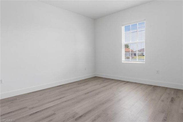 721 Ivan AVE S, Lehigh Acres, FL 33973