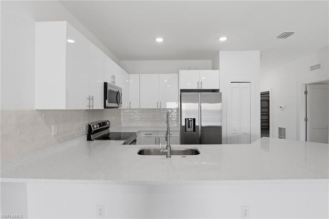 721 Ivan AVE S, Lehigh Acres, FL 33973