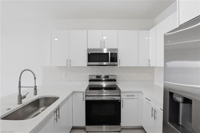 721 Ivan AVE S, Lehigh Acres, FL 33973