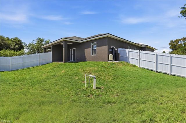 721 Ivan AVE S, Lehigh Acres, FL 33973