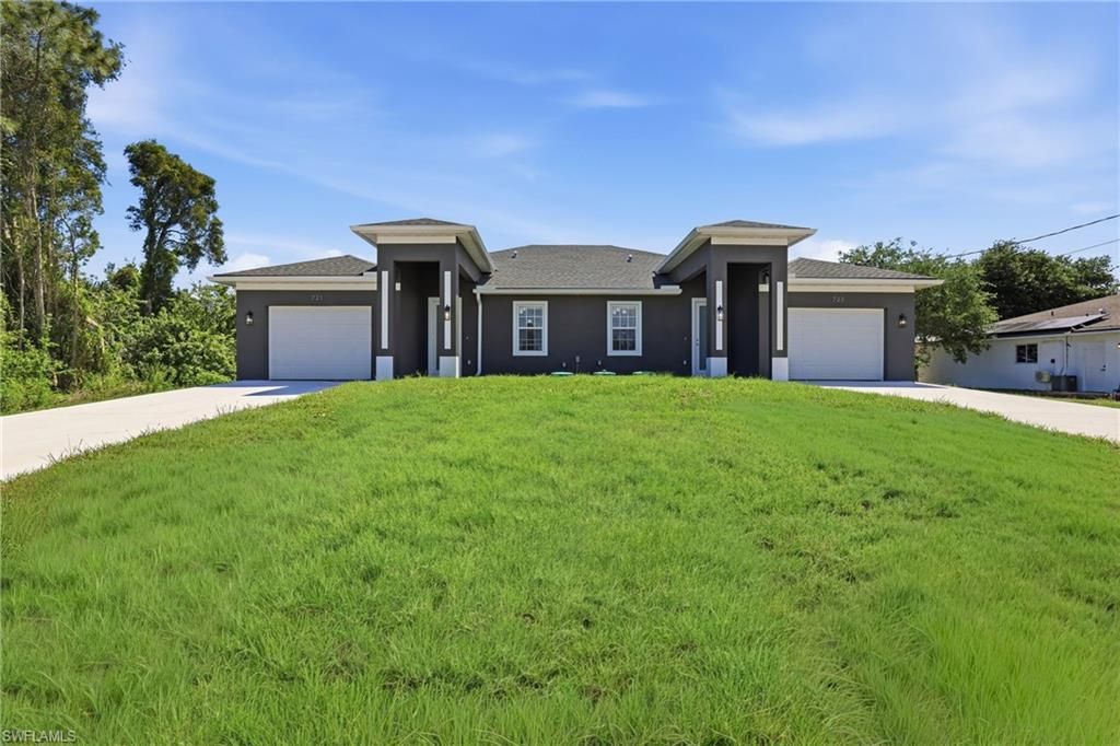 721 Ivan AVE S, Lehigh Acres, FL 33973