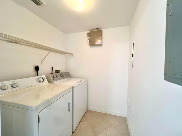 6400 EMERALD DUNES Drive 104, West Palm Beach, FL 33411