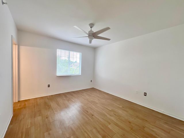 6400 EMERALD DUNES Drive 104, West Palm Beach, FL 33411