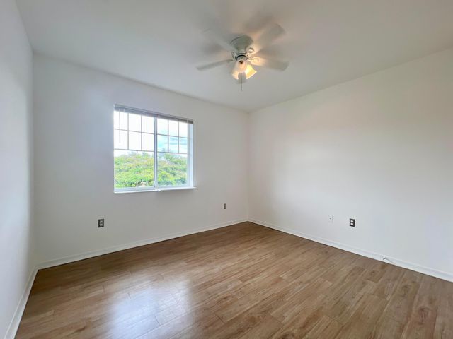 6400 EMERALD DUNES Drive 104, West Palm Beach, FL 33411