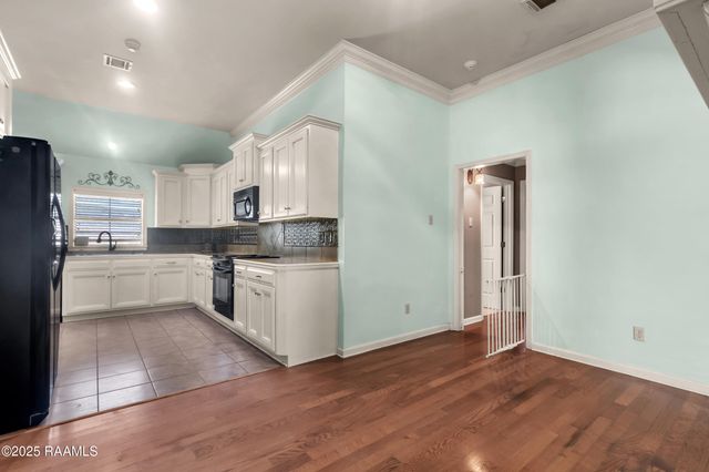 406 Quiet Meadows Drive, Youngsville, LA 70592