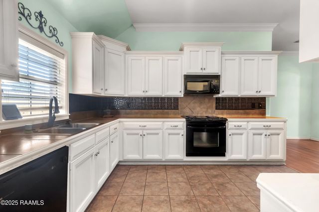 406 Quiet Meadows Drive, Youngsville, LA 70592