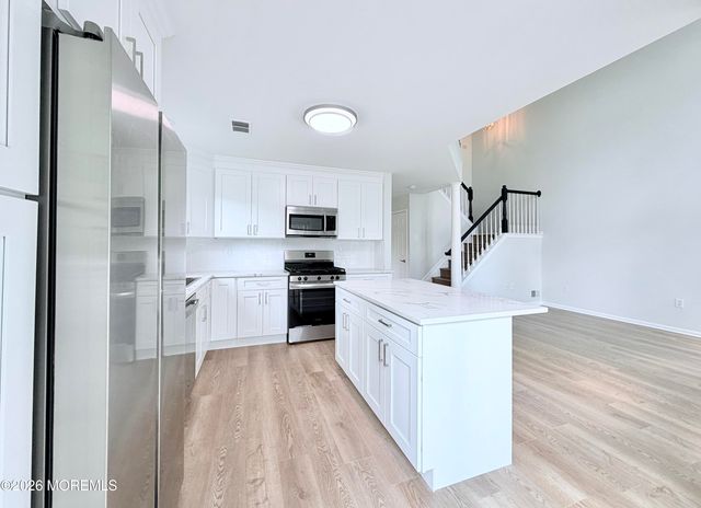 1 Whitemarsh Drive, Manalapan, NJ 07726