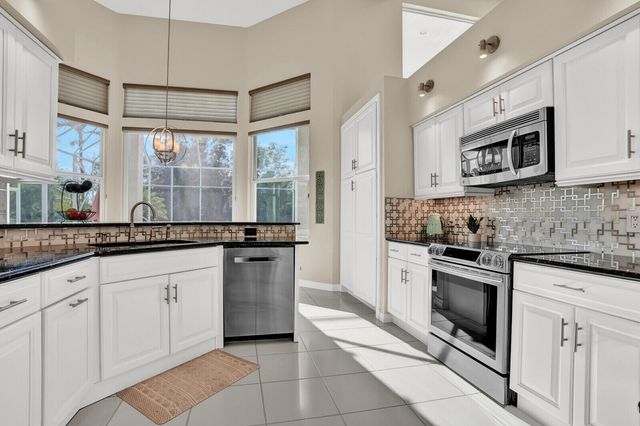 142 Corinthian Circle, Jupiter, FL 33458