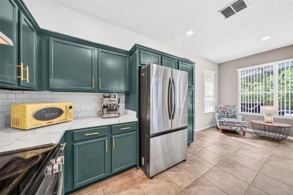 Image 5 of property listing at 2232 WINDCREST LAKE CIRCLE, Orlando, FL 32824
