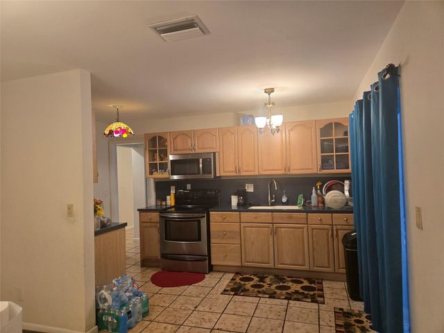 296 Alemeda Drive, Palm Springs, FL 33461