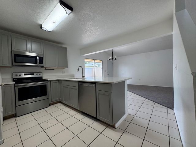 1809 TOWNHALL LANE 1809, Orlando, FL 32807