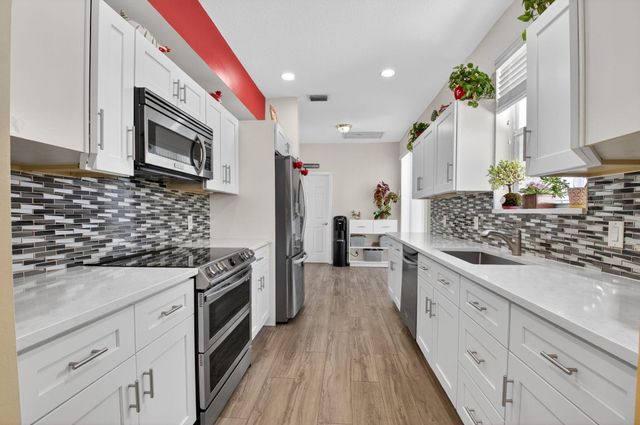 8111 Hampton Wood Drive, Boca Raton, FL 33433