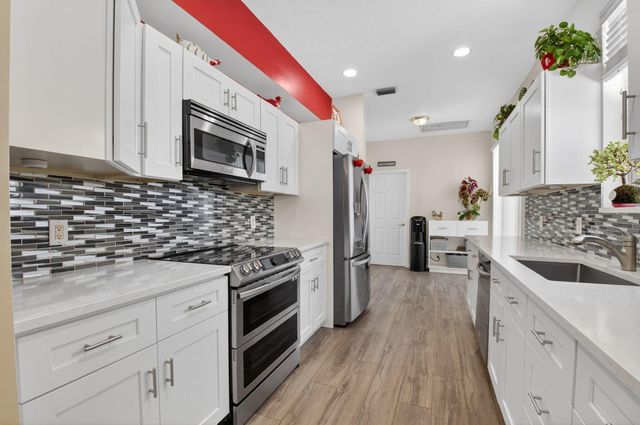 8111 Hampton Wood Drive, Boca Raton, FL 33433