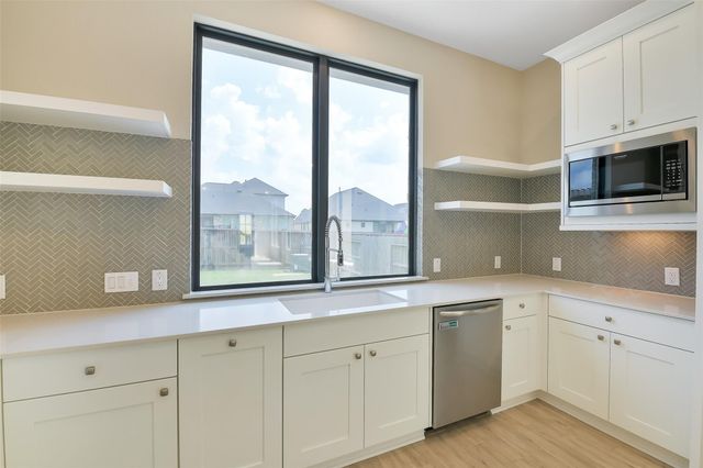 1439 Northwood Bluff Lane, Pinehurst, TX 77362