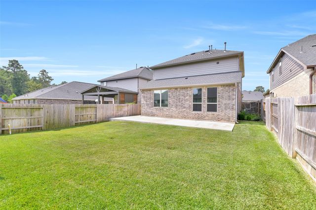 1439 Northwood Bluff Lane, Pinehurst, TX 77362