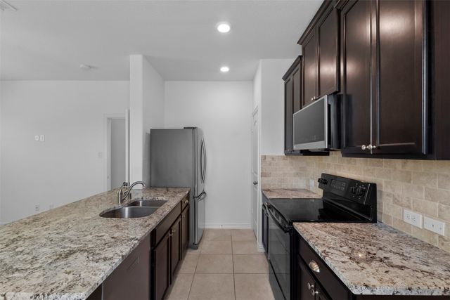 227 Chamberlain Drive, Fate, TX 75189