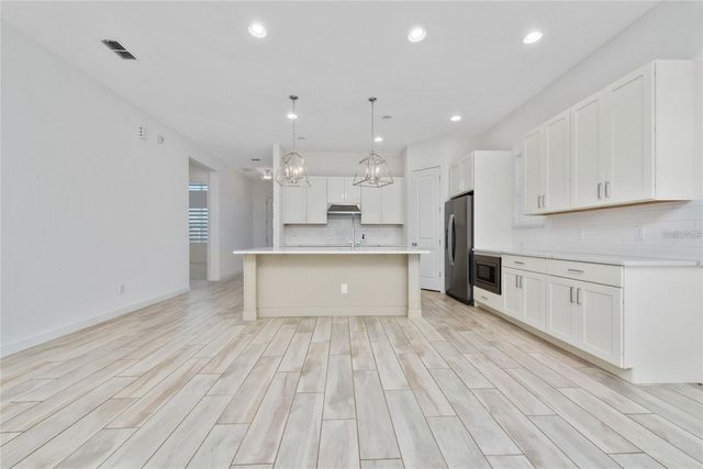 8664 DUBOCHET STREET, Orlando, FL 32827