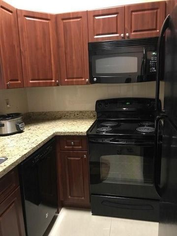 651 Lyons Road 10-203, Coconut Creek, FL 33063