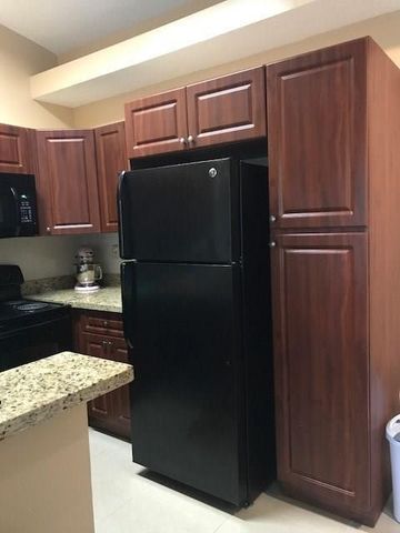 651 Lyons Road 10-203, Coconut Creek, FL 33063