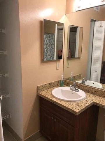 651 Lyons Road 10-203, Coconut Creek, FL 33063