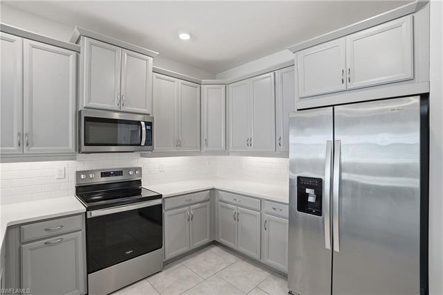 1040 Tranquil Brook DR, Naples, FL 34114