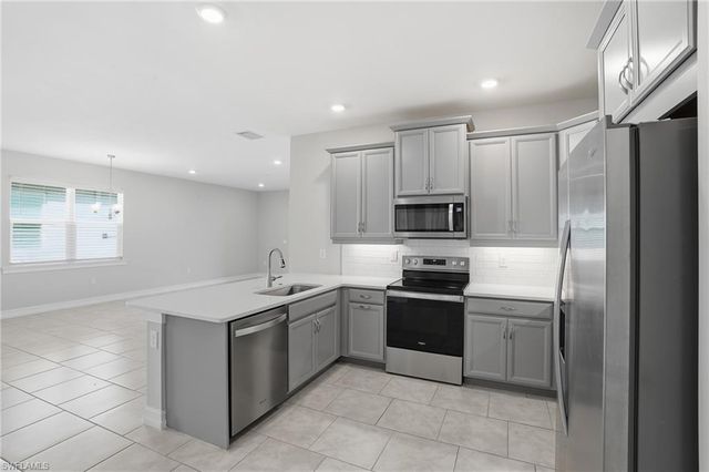 1040 Tranquil Brook DR, Naples, FL 34114