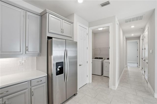 1040 Tranquil Brook DR, Naples, FL 34114