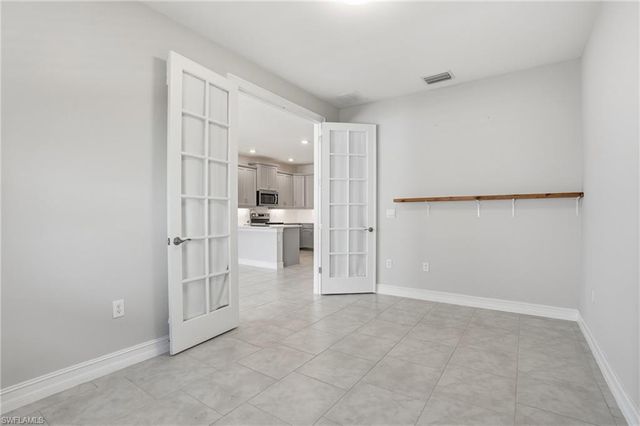 1040 Tranquil Brook DR, Naples, FL 34114