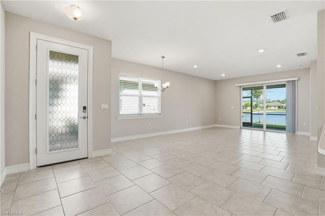 1040 Tranquil Brook DR, Naples, FL 34114