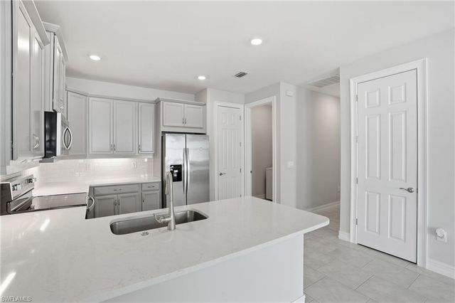 1040 Tranquil Brook DR, Naples, FL 34114