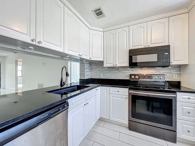 6140 BURNSIDE CIRCLE 204, Orlando, FL 32822