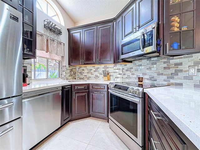 1420 Seagrape Circle, Weston, FL 33326