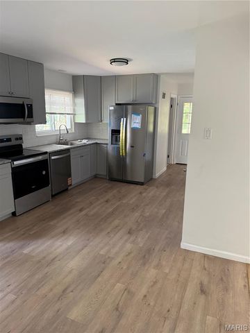 9091 Patrick Drive, St John, MO 63114