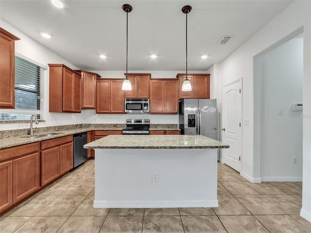 10043 NEWMINSTER LOOP, Ruskin, FL 33573