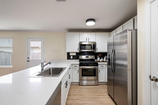 760 Hackberry Branch Court, Magnolia, TX 77354