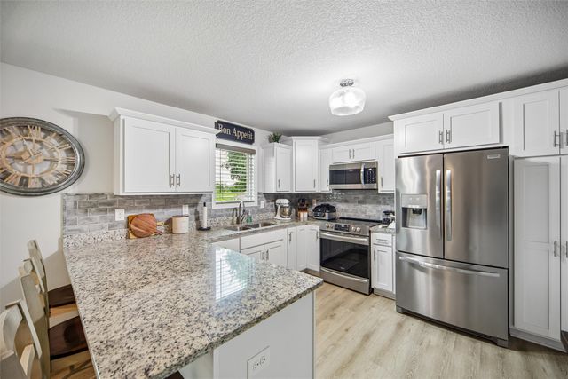 700 Patchett Drive NE, Mitchellville, IA 50169
