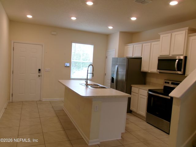 508 RUNNING WOODS Street, Orange Park, FL 32065