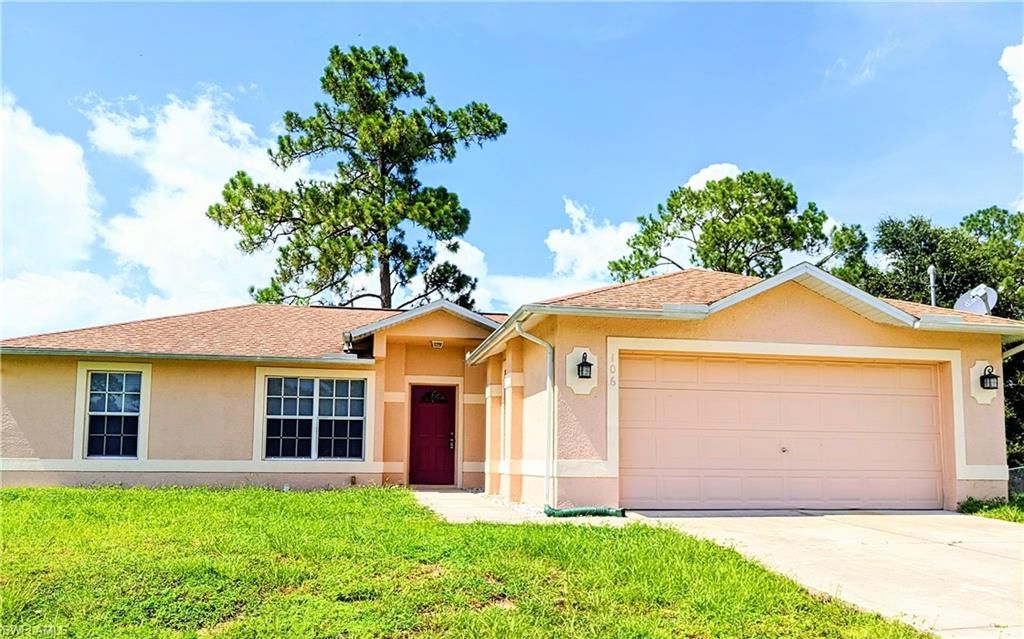 106 W 5th ST, LEHIGH ACRES, FL 33972 — exterior